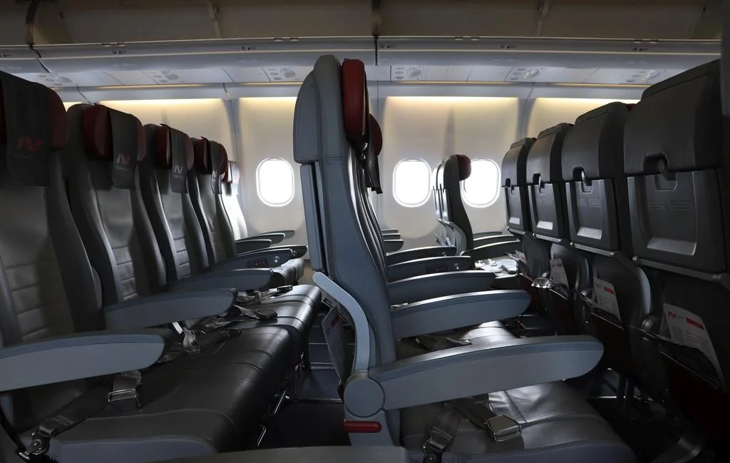 Экономический класс A330-200 Nordwind, вид от окна вдоль ряда