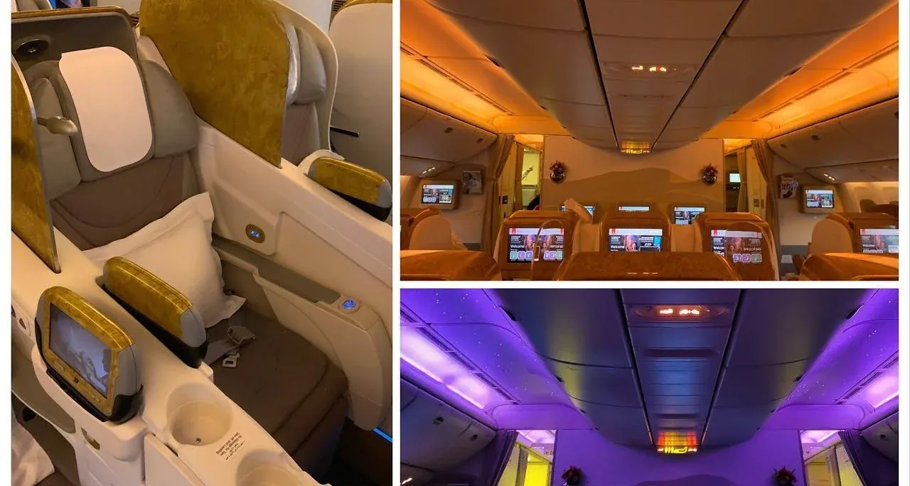 Место бизнес-класса 777-300ER Emirates: экран, подставка и золотистая отделка
